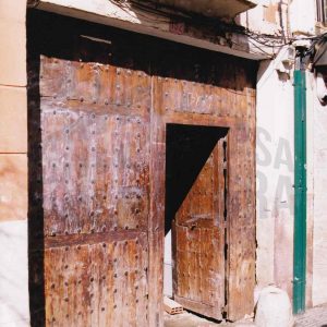 Portalón de entrada a una corrala en un edificio ya desaparecido en la Calle Stuart en Aranjuez